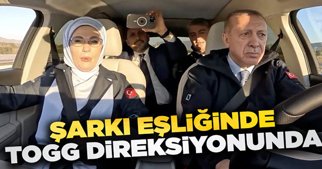 Cumhurbaşkanı Erdoğan, şarkı eşliğinde Togg direksiyonunda